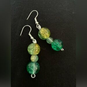 Vintage crackle glass beads crafted into stunning earrings.  Video shows colors!